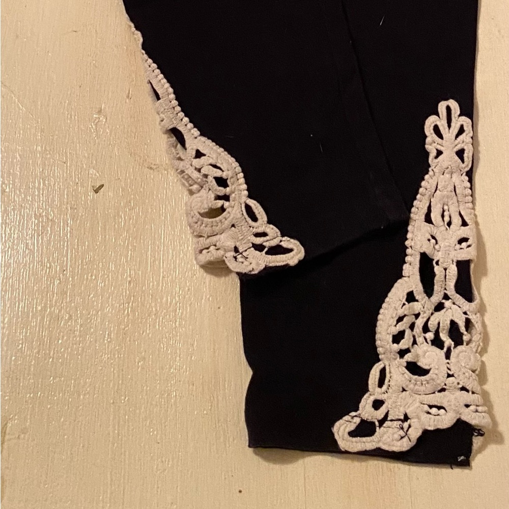 Back zenana leggings with white crocheted accent sides at ankles